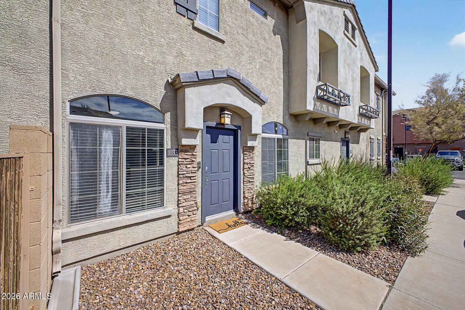 Front exterior of the townhome at Tesoro at Greenfield in Mesa