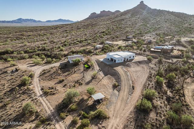 Aerial view of the property with the San Tan Mountains behind it