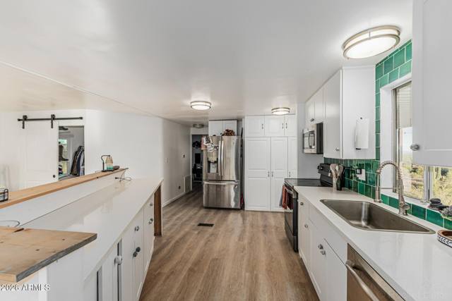 Guest house kitchen, with its own laundry