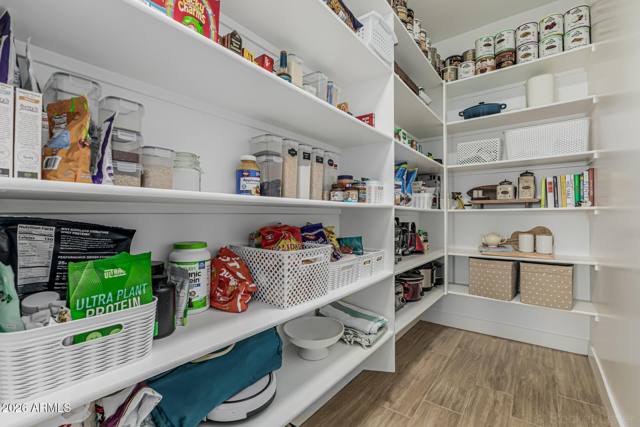 Walk-in pantry with full-height shelving